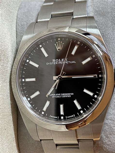 rolex perpetual 39 black dial